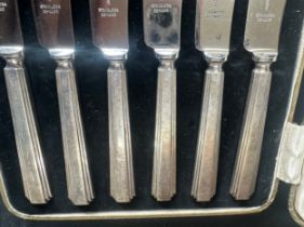 Set of 6 cased silver handled knives