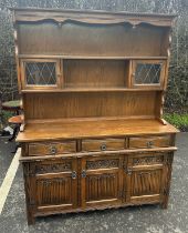 Old charm dresser measures approximately 69 inches tall 53 inches wide 17 inches depth