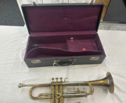 Vintage cased trumpet made by Boosey and Hawkes LTD with two mouth pieces