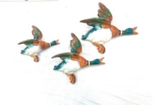 Set of 3 Beswick graduating wall hanging ducks, damage to wing and beak but has been repaired