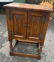 2 Door old charm cupboard measures approximately 28 inches tall 19 inches wide 14 inches depth