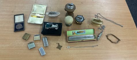 Selection of vintage collectable items to include lighters, whistles et