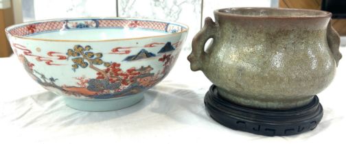 2 Pieces of chinese pottery, one has a wooden stand