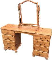 Pine knee hole dressing table with 8 drawers and barley twist swing mirror 29 inches tall 52