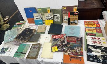 Selection of vintage books includes practical motorist, fiat, haynes car manuals etc
