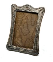 Antique silver picture frame measures approx 17.5cm by 13cm
