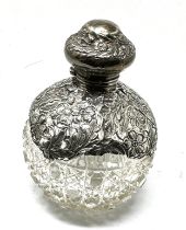 Large Antique silver & cut glass perfume / scent Bottle measures approx height 14.5cm diameter