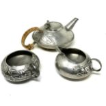 Archibald Knox for Liberty & Co. Tudric pewter three piece tea set no.0231 The teapot measures