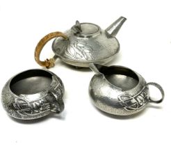 Archibald Knox for Liberty & Co. Tudric pewter three piece tea set no.0231 The teapot measures