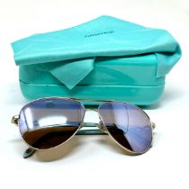 boxed Tiffany & Co sunglasses in previously owned condition Signs of age & wear Please see