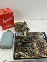 Selection of vintage tools and camping stove