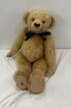 Large golden merrythought/ alpha farnell teddy bear, jointed and with growler labled height 64cms