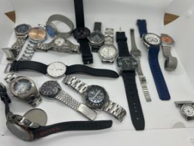 Large selection of assorted wristwatches includes Hugo boss, swatch, ben sherman, police etc, all