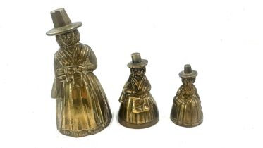 Three vintage brass lady bells