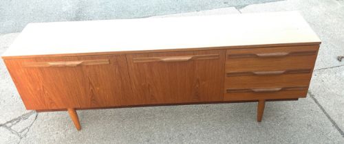 Three drawer three door long teak sideboard 1960's/70's measures approx 29 inches high by 78