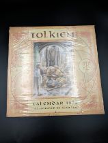 Sealed Tolkien calendars (1997, 1999, 2001) with Alan Lee and John Howe illustrations. Elevate