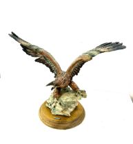 Giuseppe Armani Capodimonte golden eagle figurine measures approximately 12 inches by 15 inches