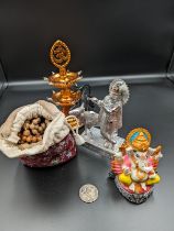 Sindu Gods/Goddesses: Ganesha idol, Krishna playing the flute made of metal, bag of prayer beads,