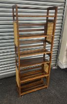 Vintage Bergère double stacking rack measures approximately 60 inches tall 24 inches wide 10