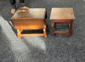 Two oak lamp tables largest measures approx 16 inches tall by 20 wide and 28 deep when extended