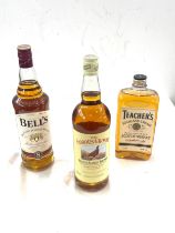 Bottle of Bells, Teachers and Famous Grouse whiskey