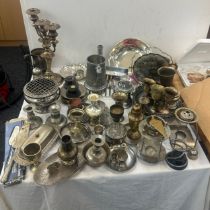 Large selection of silver plated items includes candle sticks etc