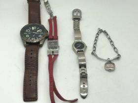 Selection of 4 watches includes Hugo boss, Gucci etc, untested