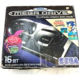 Boxed Sega mega drive includes sonic the hedgehog game in original box, untested