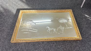 Large gilt framed etched mirror measures approx 35 inches tall by 52.5 inches wide