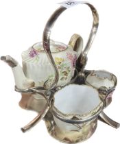 Carlton ware tea pot milk jug and sugar bowl in a silver plated stand