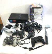 PS2 and a selection of playstation games, untested