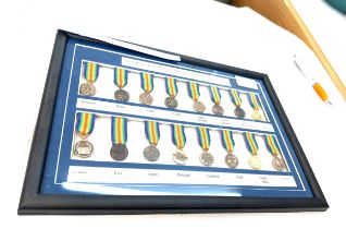 Framed set of sixteen miniature WW1 Victory medals