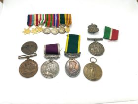 Selection of WW1 and WW2 military medals named ss gt M G Chapman R signals, Charles Thorn, DVR W G