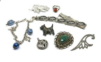 selection of silver jewellery includes pendant & bracelet brooches etc weight 67g