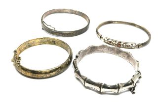 selection of 4 silver bangles weight 50g