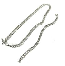 A silver stone set tennis necklace and bracelet by TGGC (54g)
