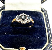 9ct gold sapphire three stone ring with diamond surround (2.1g)