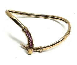 9ct gold ruby snake bangle (7g)