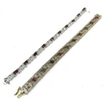 Two silver stone set bracelets including ruby and emerald set (36g)
