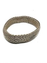 A silver bracelet by Tiffany and Co (48g)