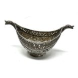 A rare mid to late nineteenth century traditional silver Kashkul or begging bowl , boat shape with