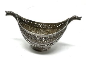 A rare mid to late nineteenth century traditional silver Kashkul or begging bowl , boat shape with