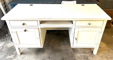 4 Drawer painted desk measures approximately 30 inches 60 inches wide by 24 inches