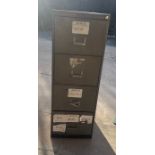 Four drawer filing cabinet one handle slightly damaged