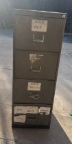 Four drawer filing cabinet one handle slightly damaged