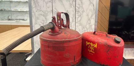 Vintage Protectoseal co petrol can and a vintage PMI petrol can