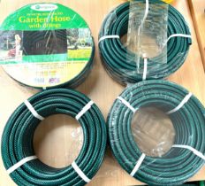 Four 30 metre hose pipes