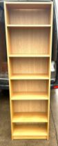 6 shelf oak. Bookcase measures approximately 80 inches tall 24 inches wide 11 inches depth