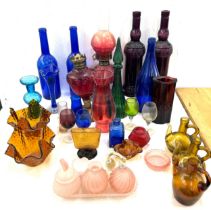 Large selection of coloured glass includes decanters etc