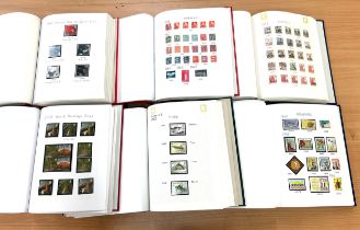 Selection of 6 stamp albums to include Classic British sport cards, fish, World heritage sights etc